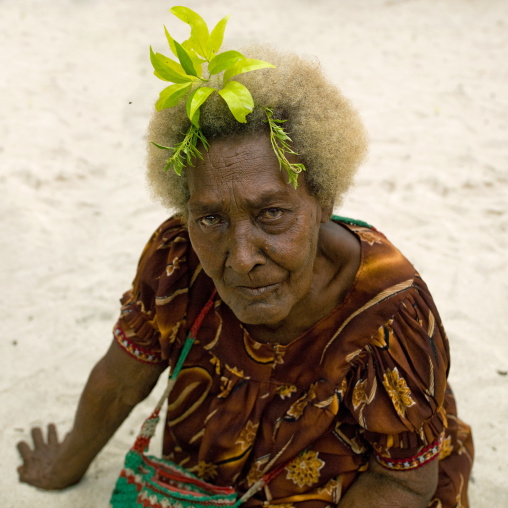 Old woman with blonde hair, New Ireland Province, Kavieng, Papua New Guinea