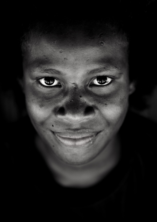 Portrait of a young girl smiling, New Ireland Province, Kapleman, Papua New Guinea