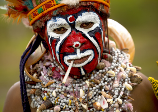 Portrait of a Highlander woman smoking during a sing-sing, Western Highlands Province, Mount Hagen, Papua New Guinea