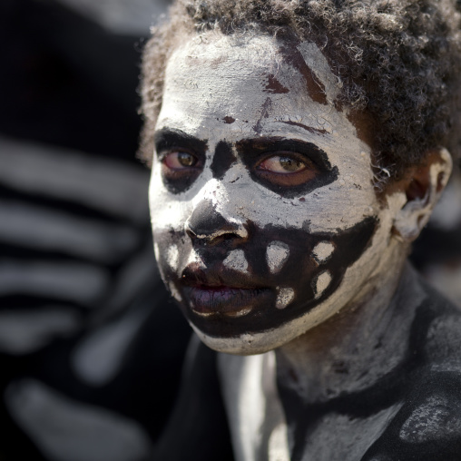Skeleton tribe boy during a sing-sing ceremony, Western Highlands Province, Mount Hagen, Papua New Guinea