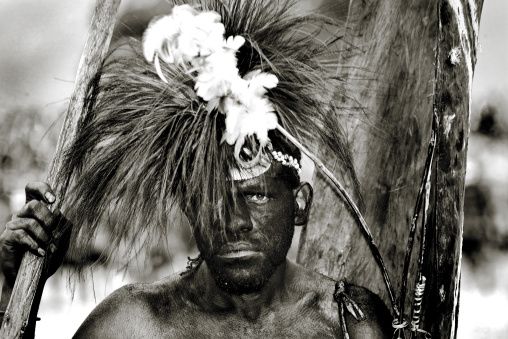 Chimbu tribe man with headdress made of eagle feathers during a sing sing, Western Highlands Province, Mount Hagen, Papua New Guinea