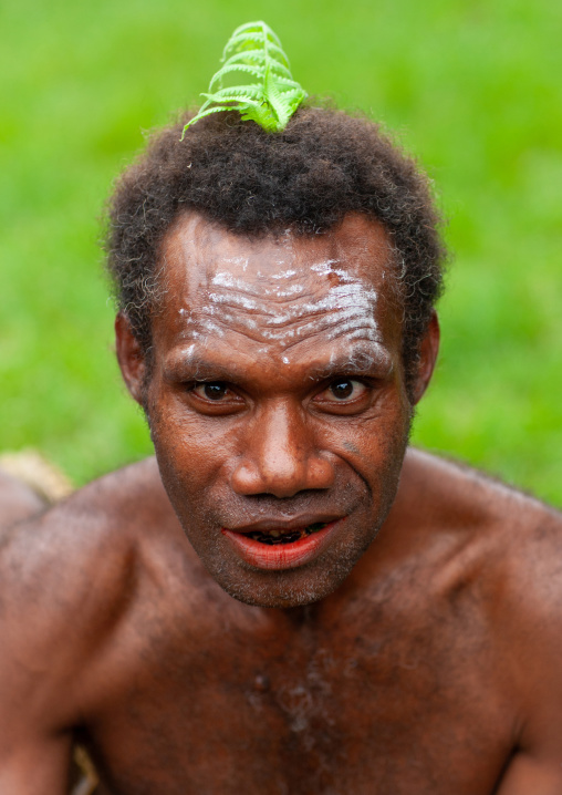 Portrait of a man with a betel red smile, East New Britain Province, Rabaul, Papua New Guinea