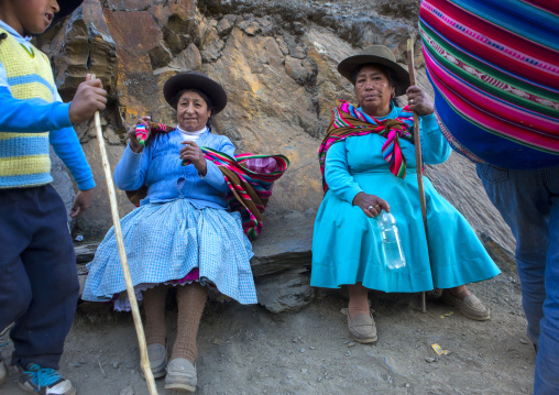 Old Peruvian Woman Resting On The The Way To Qoyllur Riti Festival, Ocongate Cuzco, Peru