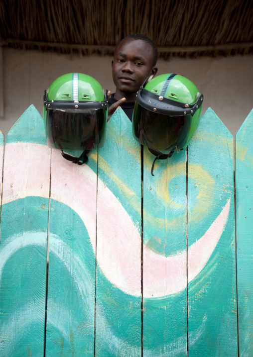 Rwandan taxi moto man with helmets, Kigali Province, Kigali, Rwanda