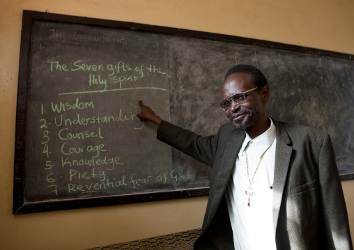 Rwandan christian religious teacher in school, Kigali Province, Kigali, Rwanda