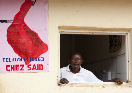 Rwandan muslim butcher in his shop, Kigali Province, Kigali, Rwanda