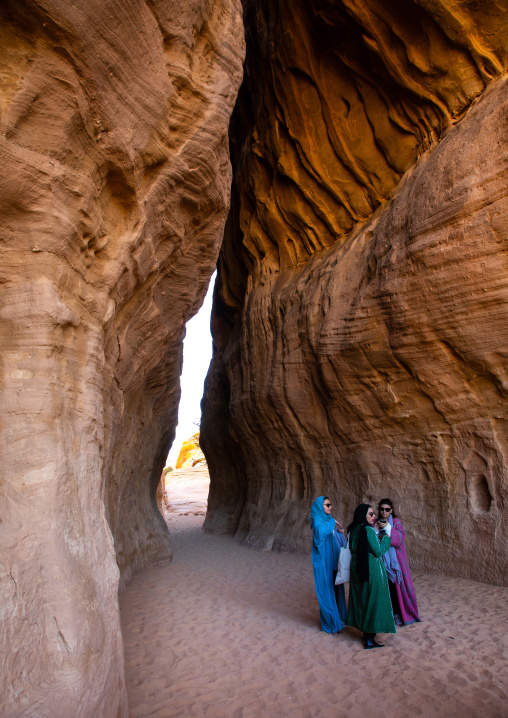 Tourists in al-Diwan in jebel Ithlib, Al Madinah Province, Alula, Saudi Arabia