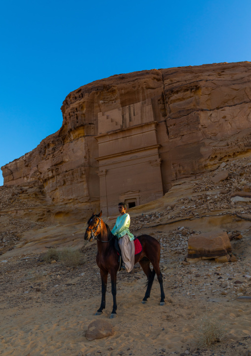 Saudi actor riding a horse during a play in an open air theater in Madain Saleh, Al Madinah Province, Alula, Saudi Arabia