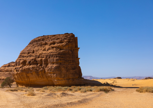 Side view of qasr al-Farid tomb of Lihyan son of Kuza in Madain Saleh, Al Madinah Province, Alula, Saudi Arabia