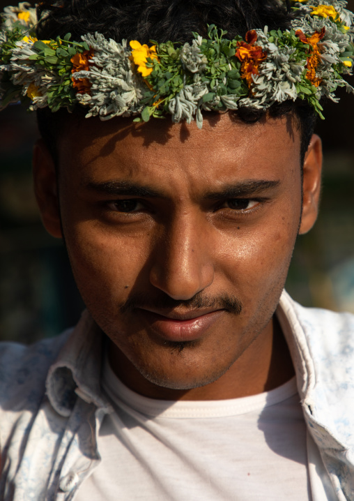 Portrait of a flower man wearing a floral crown on the head, Jizan province, Sabya, Saudi Arabia