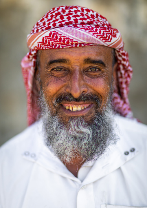 Portrait of a smiling saudi man wearing a keffiyeh, Jizan province, Addayer, Saudi Arabia