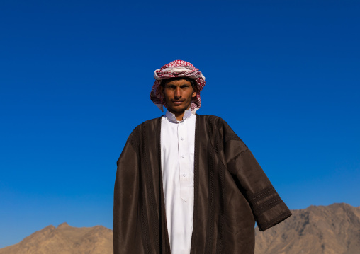 Portrait of a saudi man wearing a coat against the cold, Najran Province, Najran, Saudi Arabia