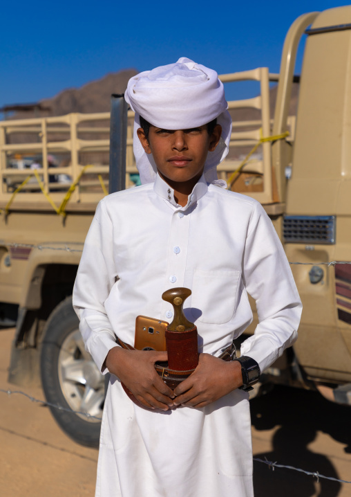 Portrait of a saudi boy wearing a white tradtional clothing, Najran Province, Najran, Saudi Arabia