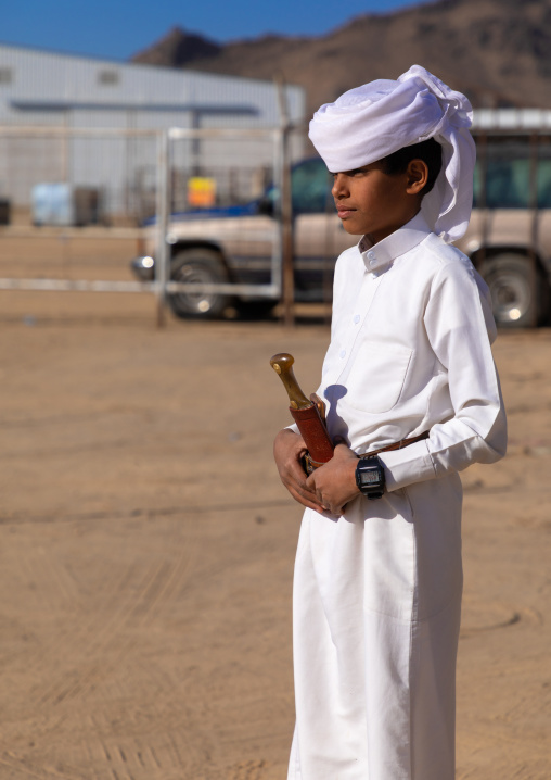 Portrait of a saudi boy wearing a white tradtional clothing, Najran Province, Najran, Saudi Arabia