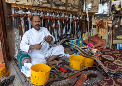 Portrait of saudi man selling jambiyas, Najran Province, Najran, Saudi Arabia