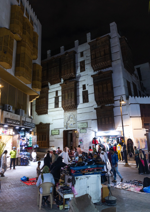 Market in front of a historic house with wooden mashrabiyas in al-Balad quarter, Mecca province, Jeddah, Saudi Arabia