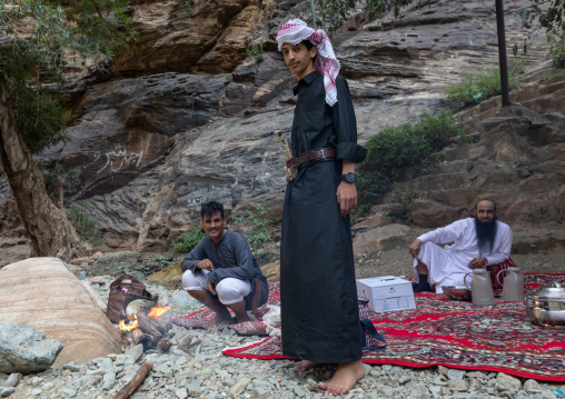 Saudi men having picnic in wadi lajab, Jizan Province, Jebel Qahar, Saudi Arabia