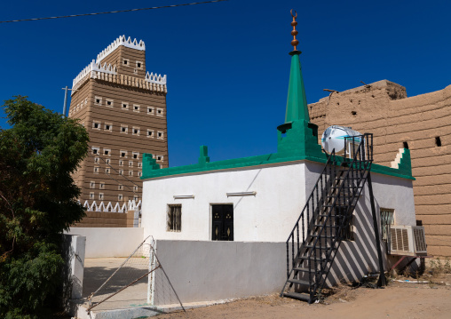 Mosque in front of a traditional old mud house, Najran Province, Najran, Saudi Arabia