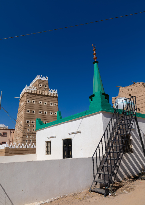 Mosque in front of a traditional old mud house, Najran Province, Najran, Saudi Arabia