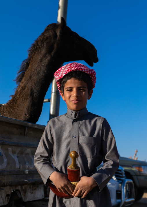 Saudi boy in the camel market, Najran Province, Najran, Saudi Arabia