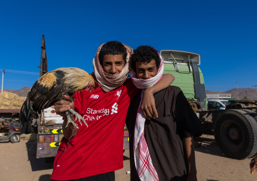Young saudi men in the bird market, Najran Province, Najran, Saudi Arabia