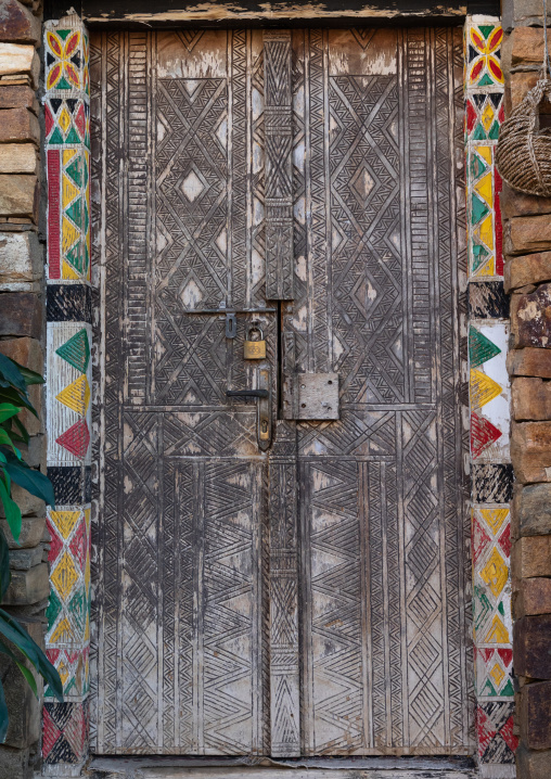 Colorful wooden door of an old asiri house, Asir province, Khamis Mushait, Saudi Arabia