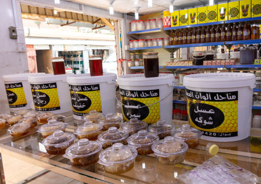 Honey and honeycombs for sale in a shop, Asir province, Abha, Saudi Arabia