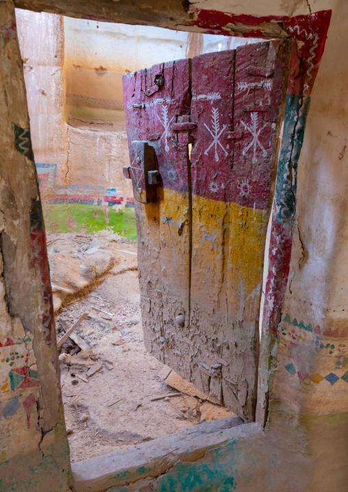 Old wooden door of an abandonned house, Asir province, Sarat Abidah, Saudi Arabia