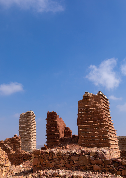 Red stone and mud houses and watchtower with slates in a village, Asir province, Sarat Abidah, Saudi Arabia