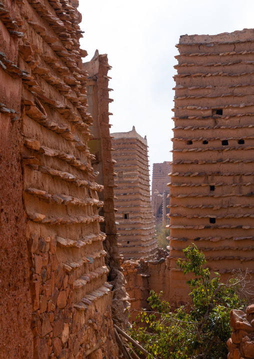 Red stone and mud houses with slates in a village, Asir province, Sarat Abidah, Saudi Arabia