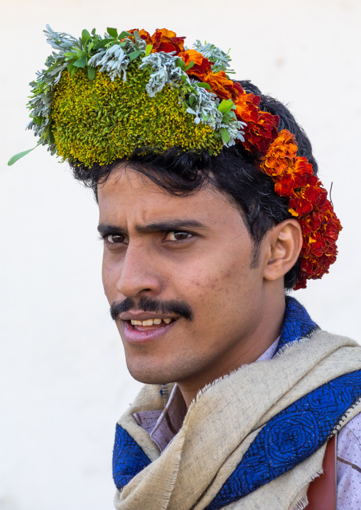 Portrait of a flower man wearing a floral crown on the head, Jizan Province, Addayer, Saudi Arabia