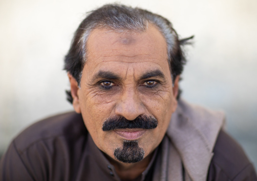Portrait of a saudi man with kohl on his eyes, Jizan Province, Addayer, Saudi Arabia