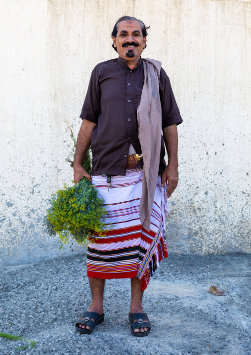 Portrait of a flower man with a floral crown in the hand, Jizan Province, Addayer, Saudi Arabia