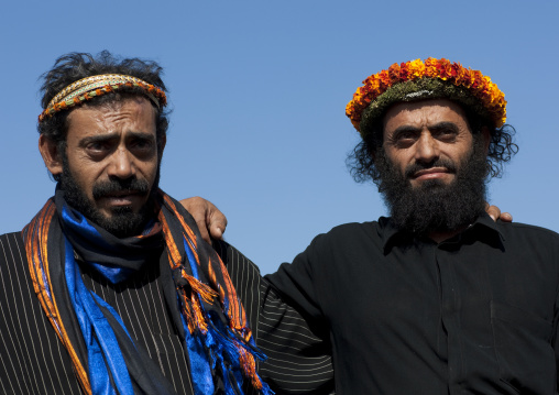 Portrait of flower men wearing a floral crown on the head, Jizan province, Addayer, Saudi Arabia