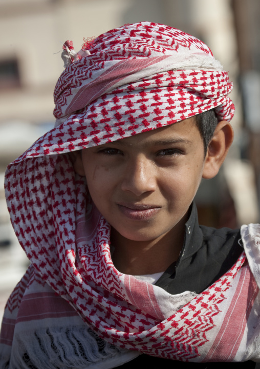 Portrait of a saudi boy wearing a keffiyeh, Jizan province, Addayer, Saudi Arabia