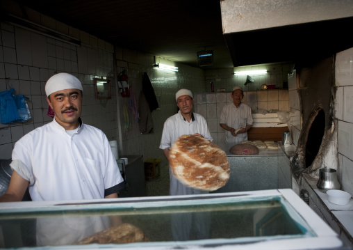 Men making bread, Asir province, Sarat Abidah, Saudi Arabia