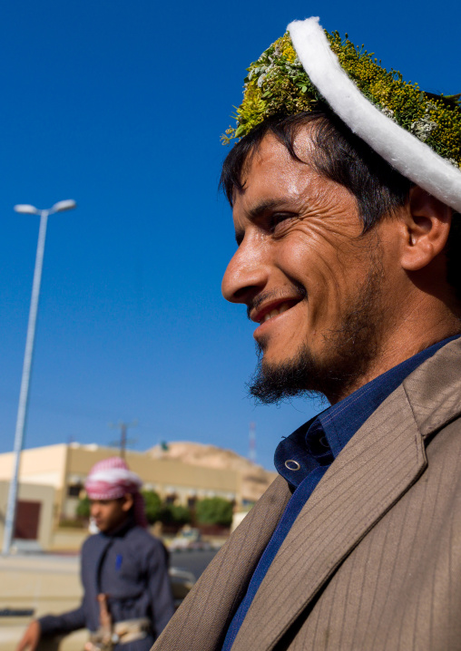 Portrait of a smiling saudi flower man, Asir province, Al Farsha, Saudi Arabia