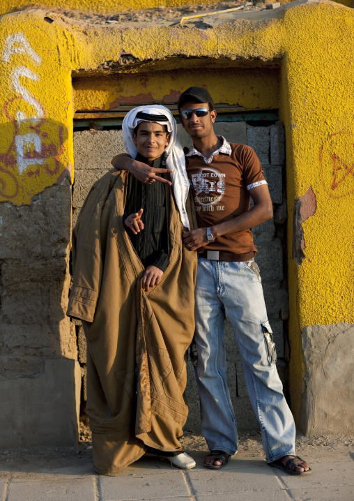 Portrait of saudi teenagers with traditional and modern clothes, Najran Province, Najran, Saudi Arabia