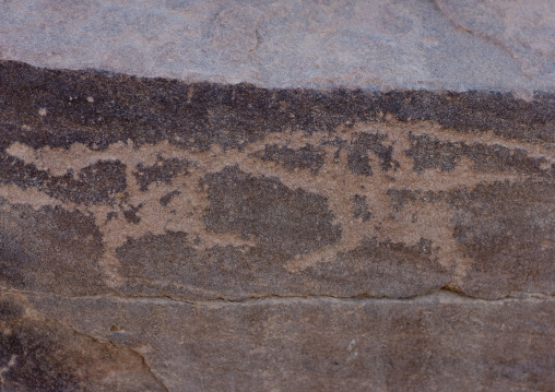 Petroglyphs on a rock depicting hunters, Najran Province, Abar Himma, Saudi Arabia