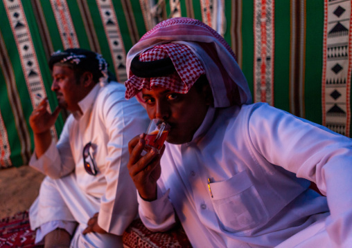 Bedouin drinking tea in a tent in the desert, Najran Province, Najran, Saudi Arabia