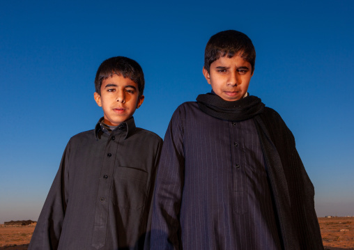 Portrait of two saudi boys, Al Madinah Province, Al-Ula, Saudi Arabia
