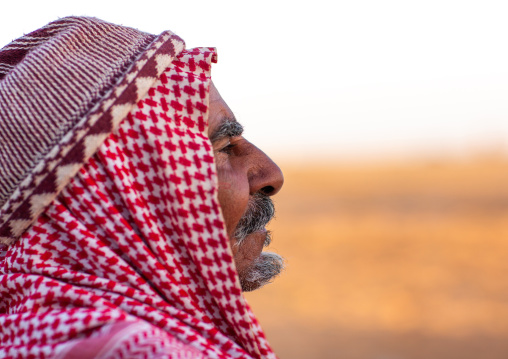 Portrait of a saudi man wearing a kaffiyeh, Al-Jawf Province, Sakaka, Saudi Arabia