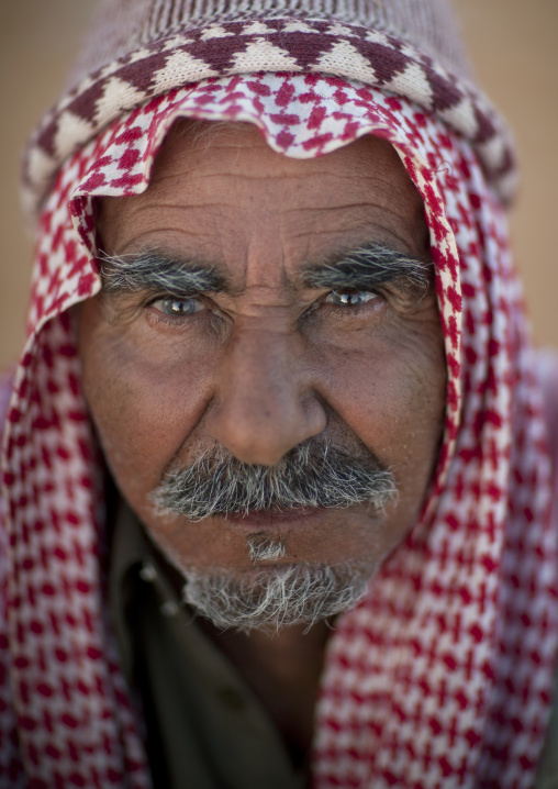 Portrait of a saudi man wearing a keffiyeh, Al-Jawf Province, Sakaka, Saudi Arabia