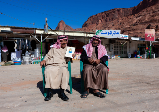 Saudi men sit in front of their shops, Al Madinah Province, Al-Ula, Saudi Arabia