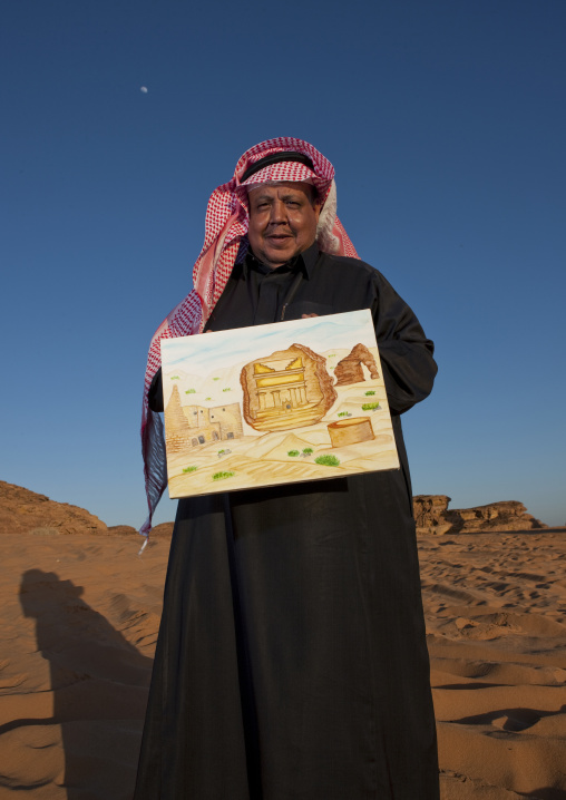 Saudi teatcher showing the drawings of his pupils, Al Madinah Province, Alula, Saudi Arabia