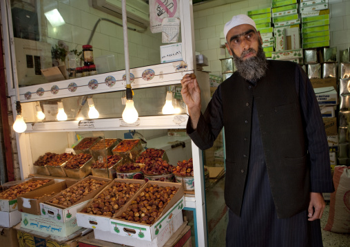 Man selling dates in the souk, Mecca Province, Taif, Saudi Arabia