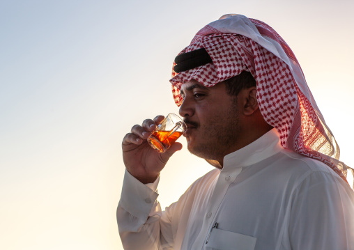 Saudi man drinking tea, Al-Sarawat, Fifa Mountains, Saudi Arabia