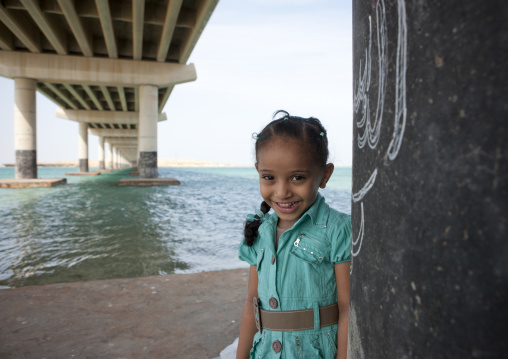 Saudi girl under a bridge, Red Sea, Farasan, Saudi Arabia