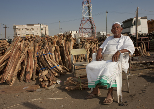 Saudi man selling wood in a market, Jizan Province, Sabya, Saudi Arabia
