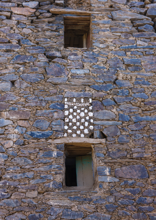 Window in rijal alma traditional village with typical aseeri architecture, Rijal Almaa Province, Rijal Alma, Saudi Arabia